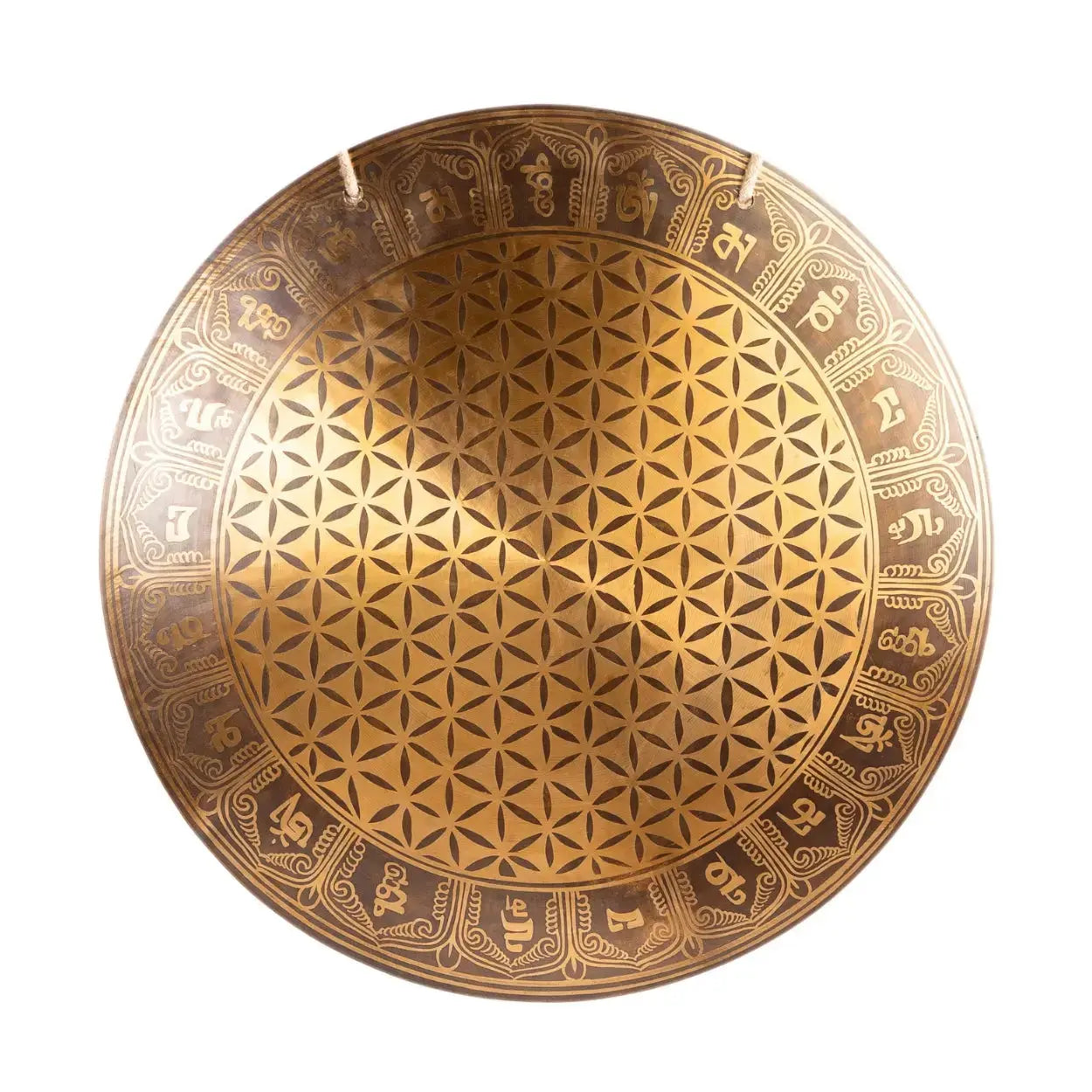 Close-up shot of the Sacred Flower of Life Gong highlighting the intricate Flower of Life pattern and Tibetan script details.